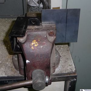 New Exhaust clamp mount bracket.