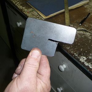 New exhaust clamp mount bracket.