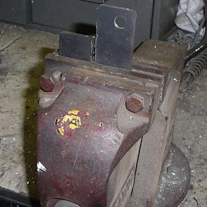 New exhaust clamp mount bracket.